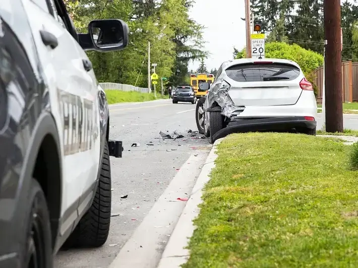 Arizona injury lawyer discussing insurance settlement after left turn collision near Estrella Mountain Regional Park