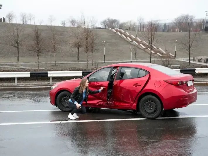 Surprise illegal left turn accident attorney reviewing crash evidence near Surprise Stadium