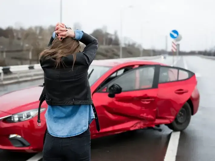 Buckeye illegal left turn accident attorney reviewing crash evidence from a wide suburban intersection near Festival Ranch