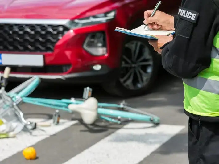 Arizona accident attorney inspecting roadway design and turn lane markings near White Tank Mountain Regional Park after a T-bone crash